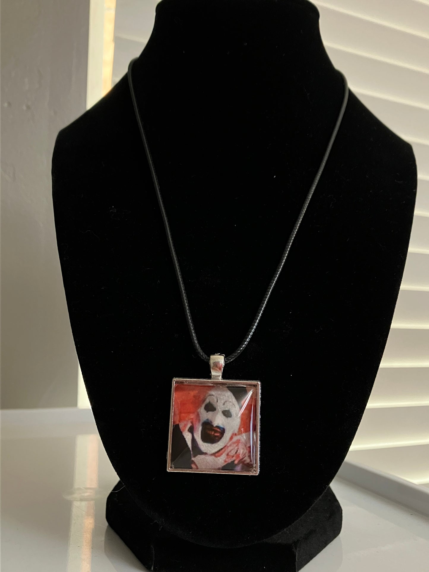 Art the clown necklace